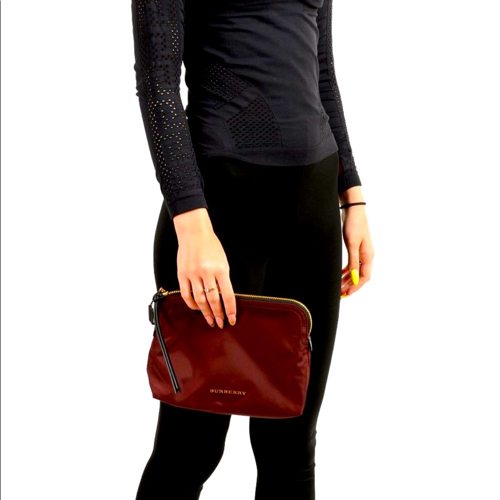 Burberry Nylon pouch in burgundy color new without tags